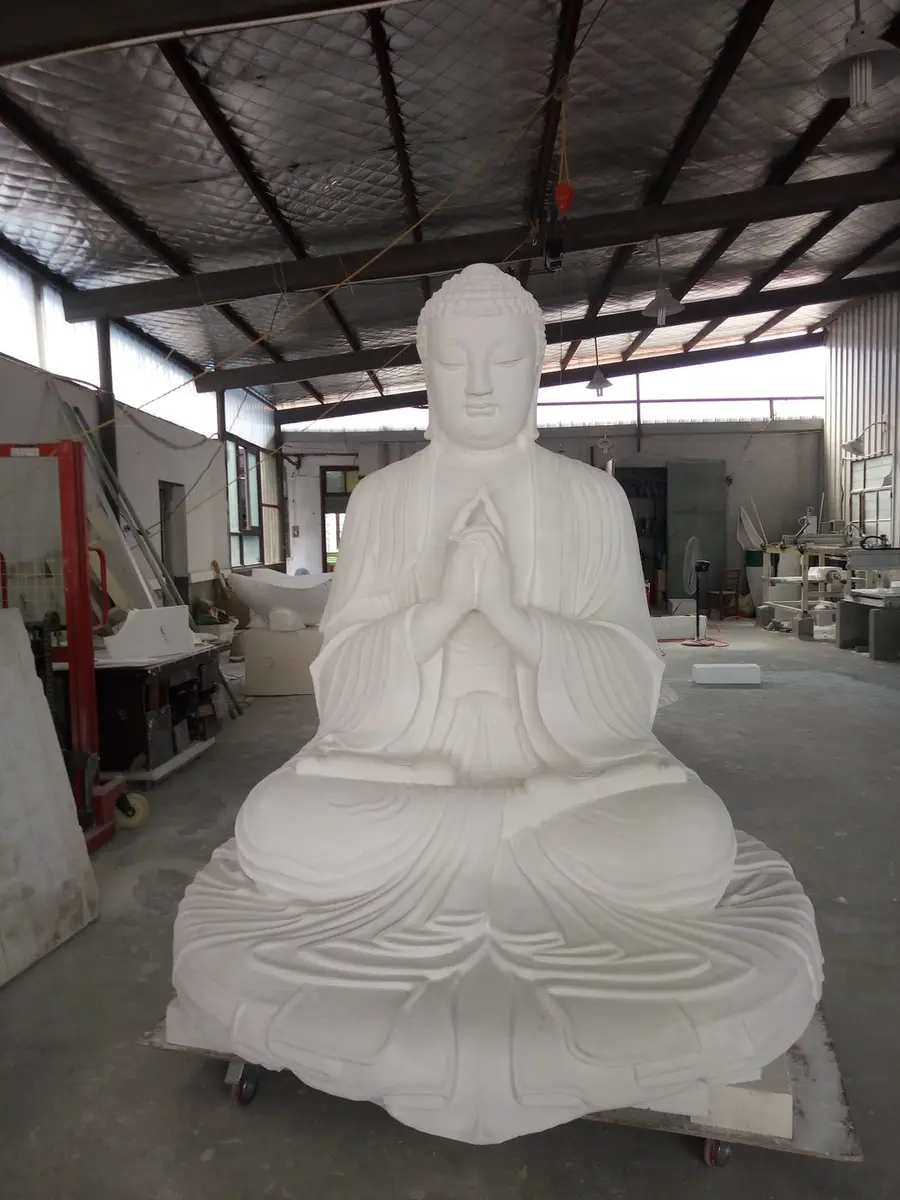 White foam master model of a seated Buddha with fine drapery