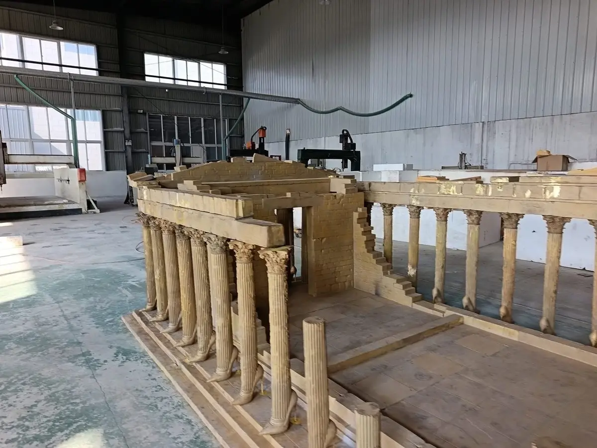 Classical European temple-style architectural sculpture model in the workshop