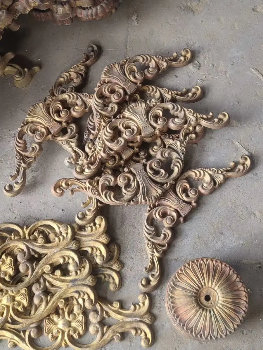 Gold ornamental relief panel with fine detailing