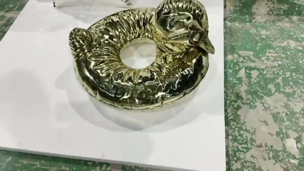 Golden duck-shaped inflatable sculpture
